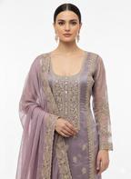 Traditional ladies suit with chiffon dupatta and festive embroidery